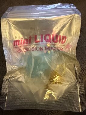 The Erosion mini Monster ice Blue liquid. Comes with a chain to make charm or?